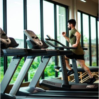 man running on treadmill